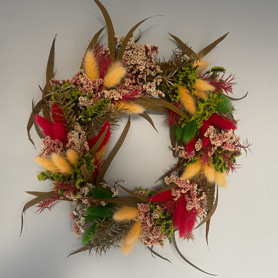 Handmade dried flower wreath with vibrant seasonal flowers